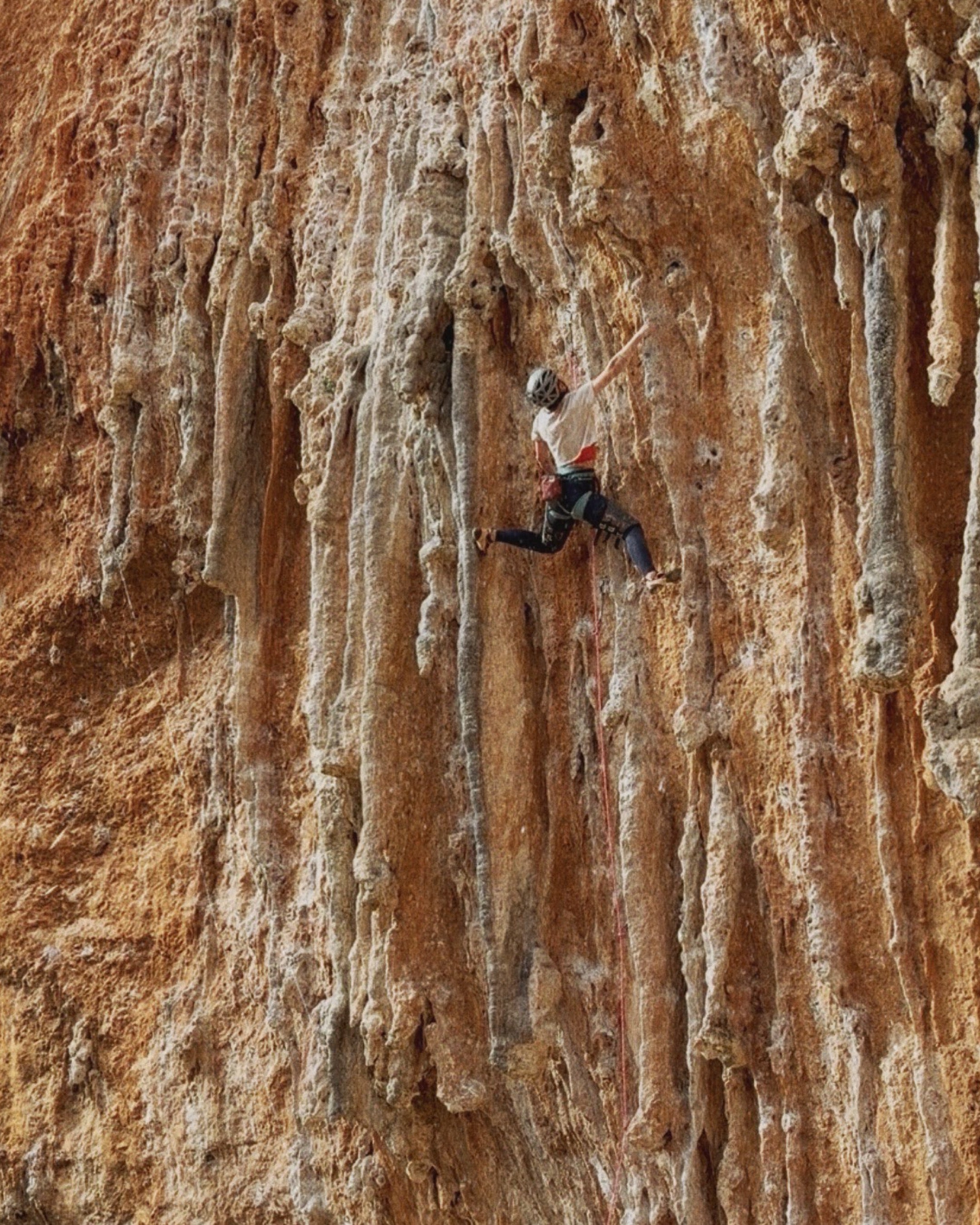 Women climbing on tufas in beige - sharing love crop top by vertical vibes